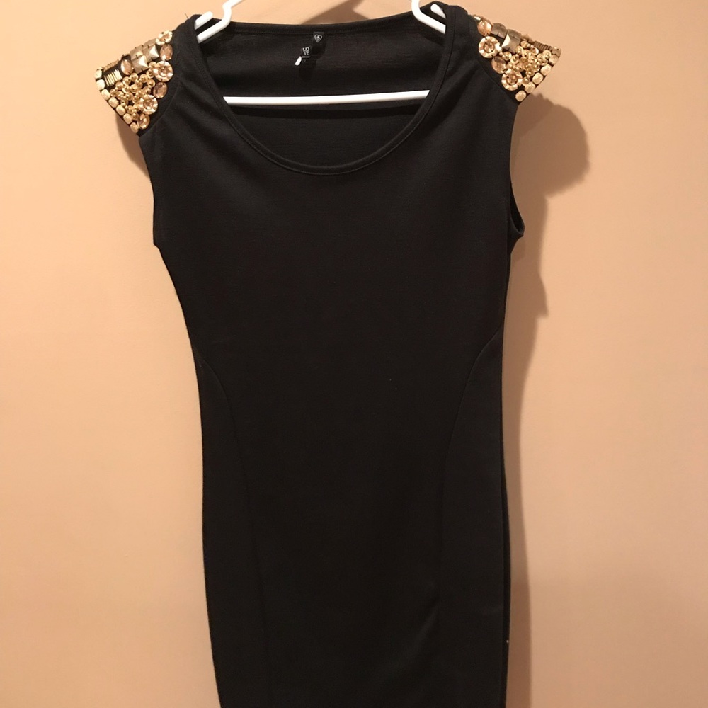 Black dress with gold jeweled shoulders